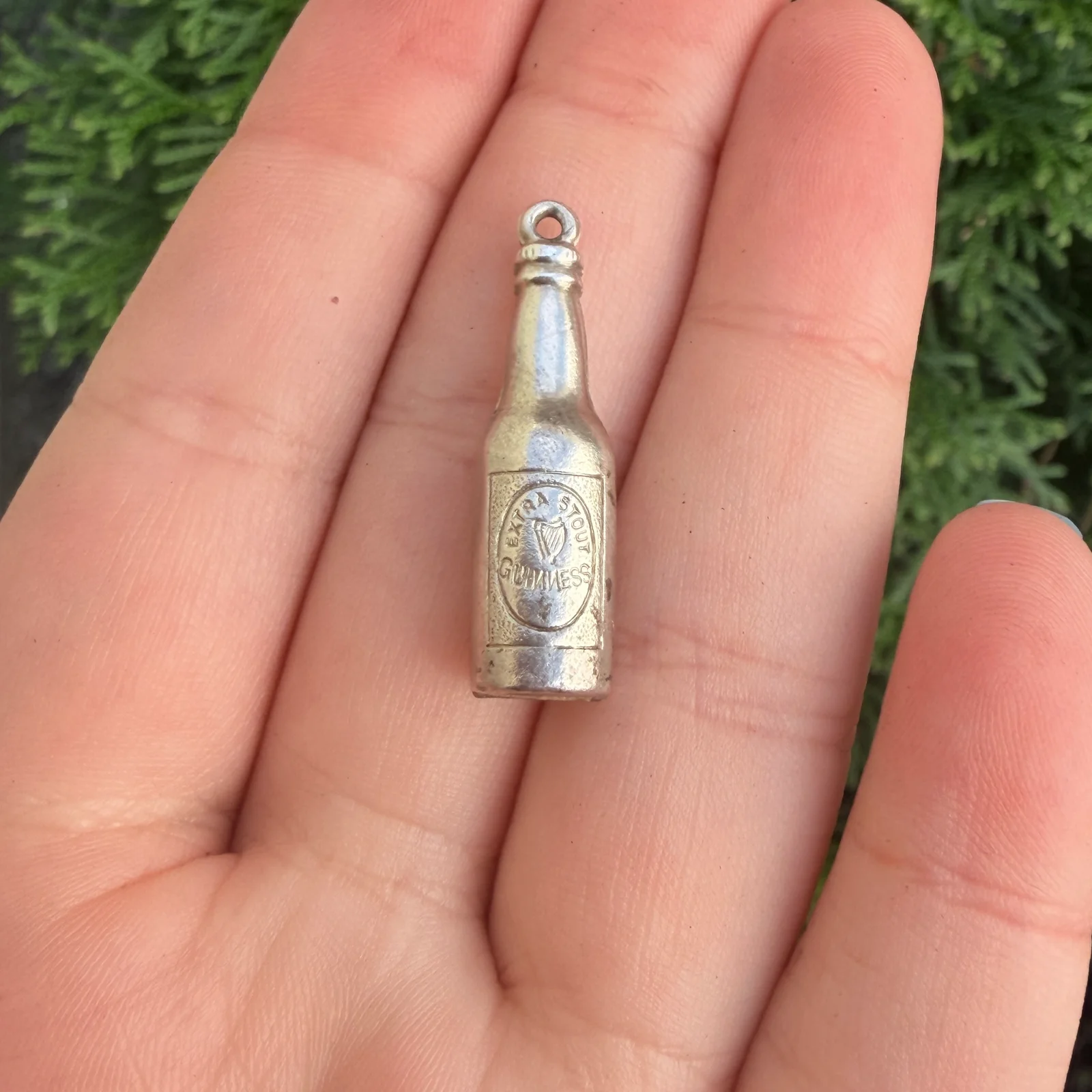 261007B-015 — 261007B-015-2.webp Vintage Silver Guinness Bottle Charm Pendant